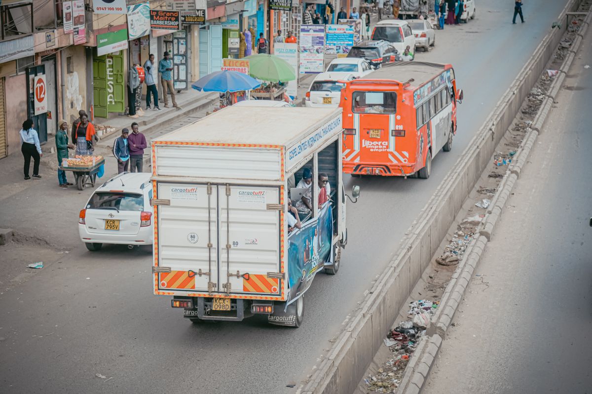 A public bus and traffic on a busy street in Nairobi, Kenya